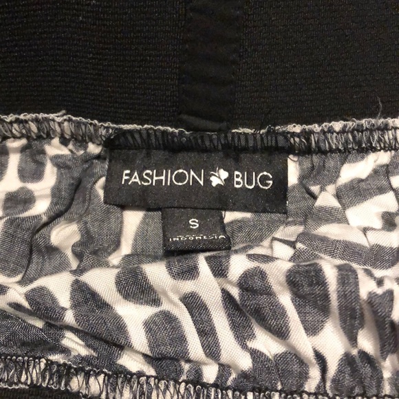 *TWO* skirts. Yellow size 4, black side Small. - Picture 8 of 9